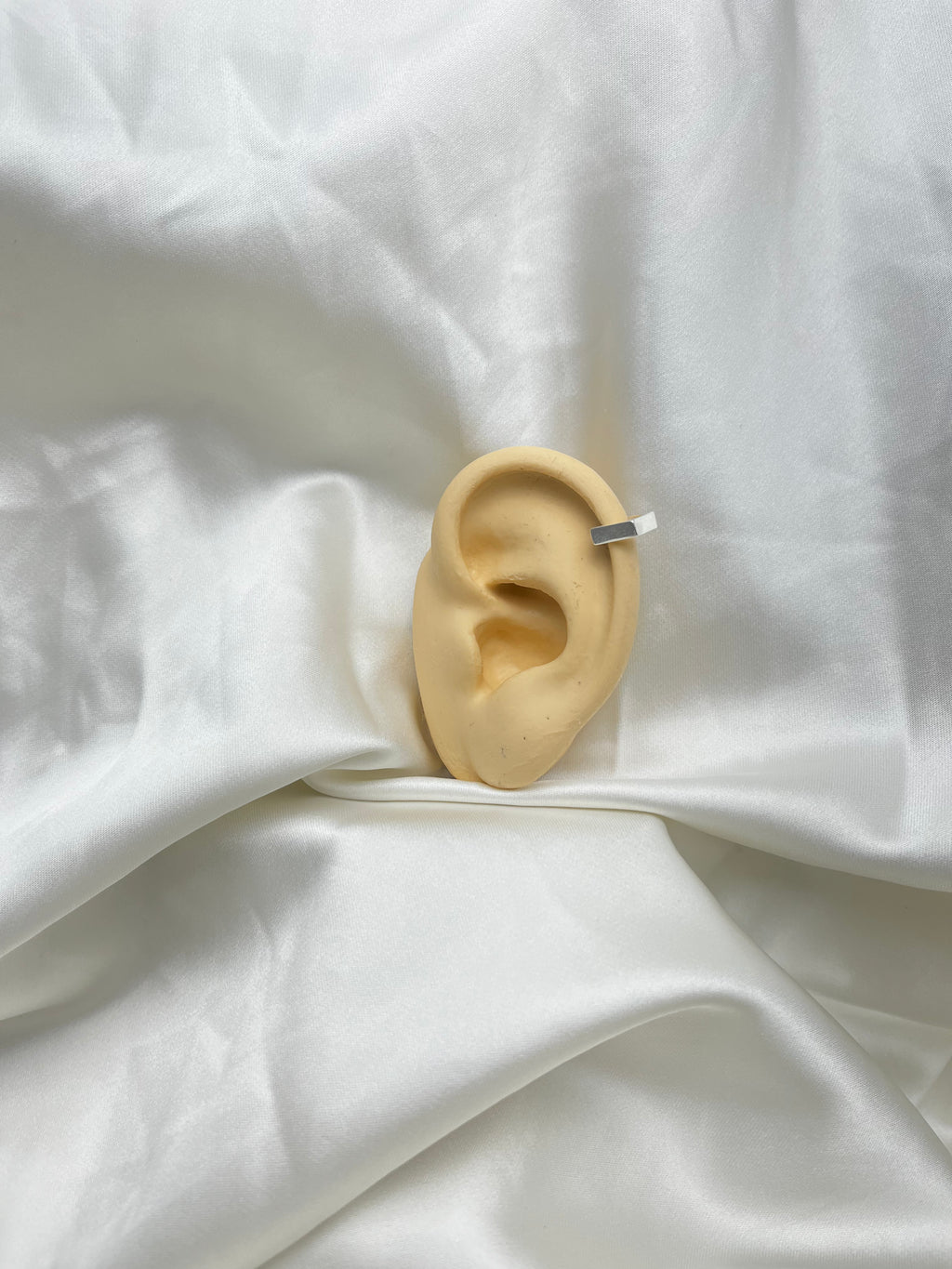 PIERCING PRESSÃO QUADRADO